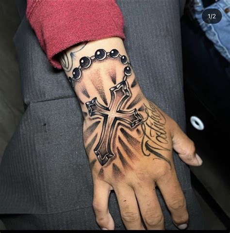 hand cross tattoo|cross hand tattoos for men.